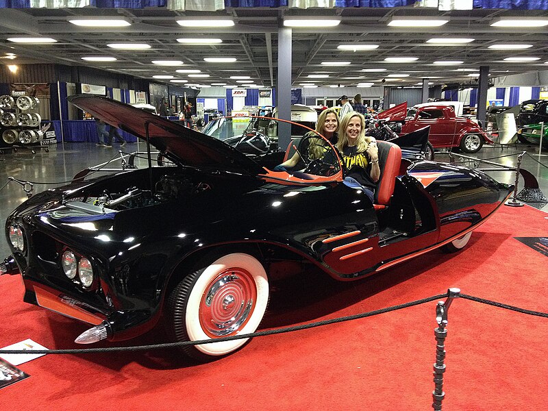 File:1963 Batmobile at exhibited at Sacramento Autorama Feb 2014 shortly after restoration completed original builders daughters Karen and Darlene Robinson in Batmobile.jpg