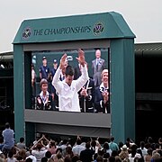 2011 Novak Djokovic after his first Wimbledon Championship win, London, UK Ank Kumar , Infosys Limited 01.jpg