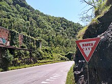 No Cav slogan on a road sign near the village of Canevara (Massa) A No Cav slogan near Canevara (Massa).jpg