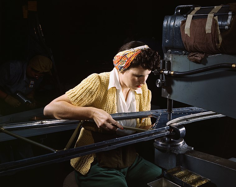 File:A girl riveting machine operator at the Douglas Aircraft Company plant joins sections of wing ribs.jpg