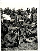 A musical party of (6th) Jats in France (near Merville). Photographer- H. D. Girdwood. (13874439144).jpg