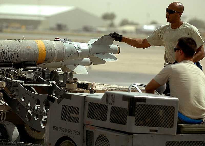 File:Airmen deployed to Afghanistan load ammo onto A-10’s for missions 110808-F-AU128-575.jpg