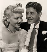 Publicity still with Barbara Lawrence and Rudy Vallée