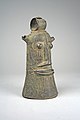 Bell with face design, currently kept in MET.