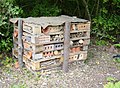 Insect hotel made from wooden pallets, West Grinstead railway station, West Sussex, United Kingdom
