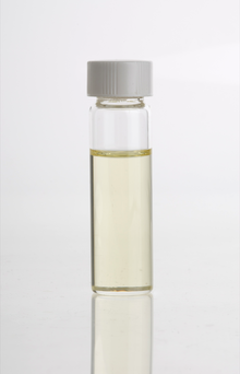 Cajuput essential oil in clear glass vial CajuputEssOil.png