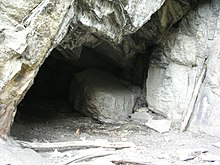 Ciumiera Cave. Nearby Iron Age remains were found. Cantalupa grotta Ciumiera ingresso.jpg