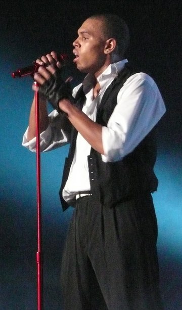 Brown singing at Brisbane Entertainment Centre in 2008.