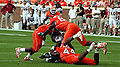 Clemson Tigers making a tackle vs. Temple Owls
