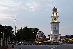 Evening view of the Jubilee Clock Tower with Fort Cornwallis in the background Cmglee Penang Jubilee Clock Tower.jpg