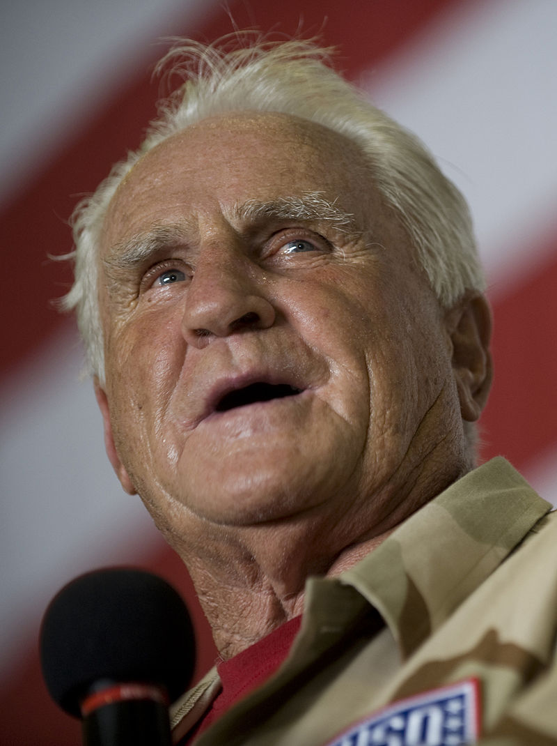 Coach of the Miami Dolphins' perfect season, Don Shula, with quarterback  Bob Griese during a halftime ceremony celebrating the undefeated 1972 team  as the Dolphins play host to the Cincinnati Bengals on