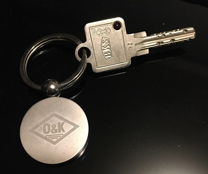 File:Door key from lock type BKS Janus on keyring from company O&K (Orenstein & Koppel).jpg