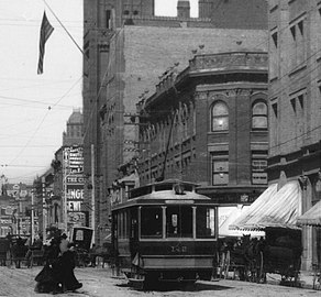 East side of Broadway looking north past 3rd St, c.1888. From left to right 1888 City Hall (with flag), Rindge Block at NE corner of 3rd, Bradbury Building