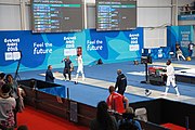 Deutsch: Fechten bei den Olympischen Jugend-Sommerspielen 2018: Tag 1, 7. Oktober 2018, Jungen, Säbel, Viertelfinale - Samuel Jarry (FRA) - Mazen Elaraby (EGY) 14:15 English: Fencing at the 2018 Summer Youth Olympics at 7 October 2018 – Boys' sabre Quarterfinals – Samuel Jarry (FRA) Vs Mazen Elaraby (EGY) 14:15