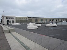 This exterior public space is sometimes used for special events Files-Public benches adjacent to Pier 15, SF.jpg