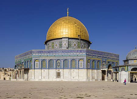 Islamic shrine with a gold dome