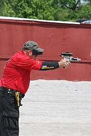 A competitor in The Bianchi Cup operating a racegun John Pride at the 2008 NRA Bianchi Cup.jpg
