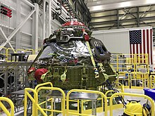 The upper and lower domes of the Boeing CST-100 Starliner Spacecraft 2 Crew Flight Test Vehicle were mated June 19, 2018, inside the Commercial Crew and Cargo Processing Facility (C3PF) at Kennedy Space Center in Florida. The Starliner was to launch astronauts on a United Launch Alliance Atlas V rocket to the International Space Station as part of NASA's Commercial Crew Program. KSC-20180619-PH BOE01 0001 (42369668434).jpg
