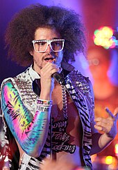 Kills was featured in "Champagne Showers", a song by LMFAO (duo member Redfoo pictured). LMFAO, 2011.jpg