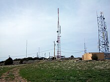 The main antenna farm atop the Lake Mountains, May 2009. The KUPX/KUTH tower is in the center.