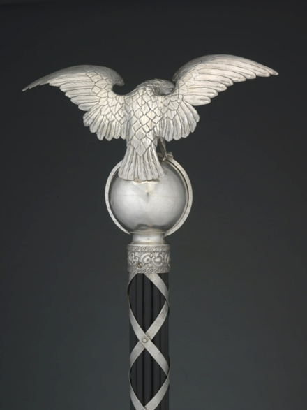 Rear view of the globe and eagle atop the Mace