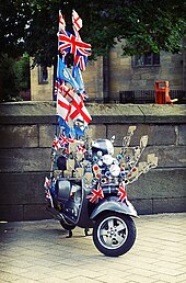 Vespa with characteristic collection of mirrors Mods Vespa GT.jpg