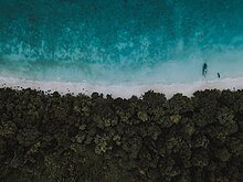 Aerial view of the shoreline at the Phi Phi Islands, Thailand Monkey Bay.jpg