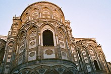 The Romanesque exterior of Monreale Cathedral, Sicily, shows the influence of Islamic architecture. Monreale-bjs-17.jpg