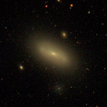 NGC 4497 — спирална галаксија во соѕвездието Девица