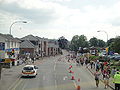 Fairlee Road, Newport, Isle of Wight photographed during the Isle of Wight Festival 2010. As can be seen, the road has been restricted to only allow traffic towards Newport due high pedestrian numbers walking towards the Festival site over the weekend, causing buses and other vehicles to be diverted along other roads. After the end of each act on the night the road is closed in both directions.