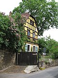 Winegrower's house (former) with annex, side building, well house and retaining wall