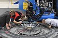 Factory workers welding the pressure vessel of the EM-2 Orion