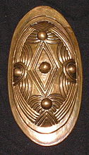 A replica of a brooch found in Fröjel, Gotland.