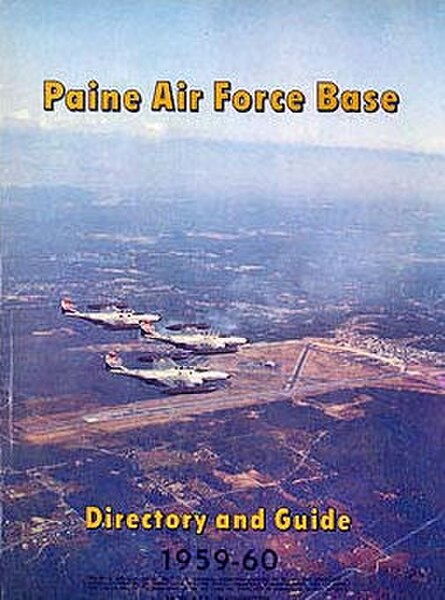 Paine AFB Directory, 1959–1960. Cover photo views the base from the northwest and showing a formation of three F-89 Scorpions overflying the airfield.