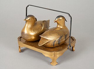 <i>Pair of Incense Boxes in the Shape of Mandarin Ducks</i> pair of incense boxes