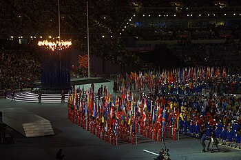 The parade of all 205 National Olympic Committee flags in the closing ceremony Parade of flags.jpg