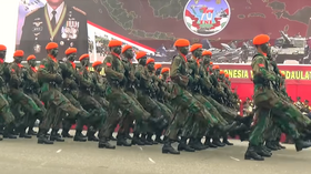 Kopasgat troops on parade wearing their distinctive orange berets Paskhas defile.png