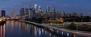 Center City Philadelphia (in background) and the Schuylkill River (on left) as seen from South Street Bridge in July 2016