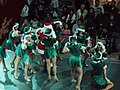 A crowd of holiday shoppers gather as Santa and his helpers put on a Christmas show atop the mall's built-in fashion show runway (November 23, 2007)