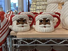 novelty mugs shaped into faces of Black Santas