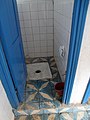 School pupils pour flush toilet (6809832186).jpg