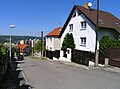 Čeština: Sekorova ulice ve vilové čtvrti Baba I. v Modřanech (Praha 12). V pozadí sídliště Modřany. English: Sekorova street in Modřany, Prague