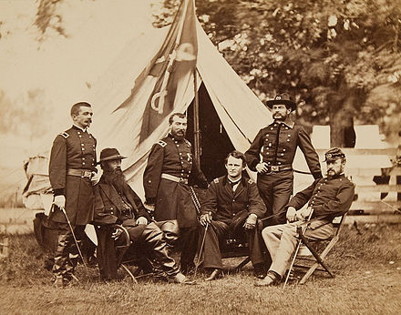 Maj. Gen. Philip Sheridan and his generals in front of Sheridan's tent, 1864. Left to right: Henry E. Davies, David McM. Gregg, Sheridan, Wesley Merritt, Alfred Torbert, and James H. Wilson.