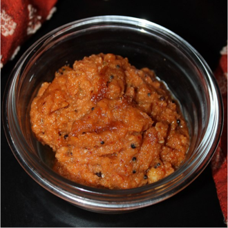 A garlic chutney in South India prepared using red chili pepper South Indian garlic chutney.png