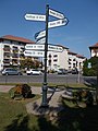 Twin town fingerpost at Szechenyi Square, 2016 Bonyhad.jpg