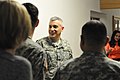 U.S. Army Col. James Saenz, center, the commander of U.S. Army Garrison Grafenwoehr, speaks with Soldiers assigned to the Office of the Staff Judge Advocate during tax filing season at Rose Barracks in Vilseck 130130-A-ZR192-073.jpg