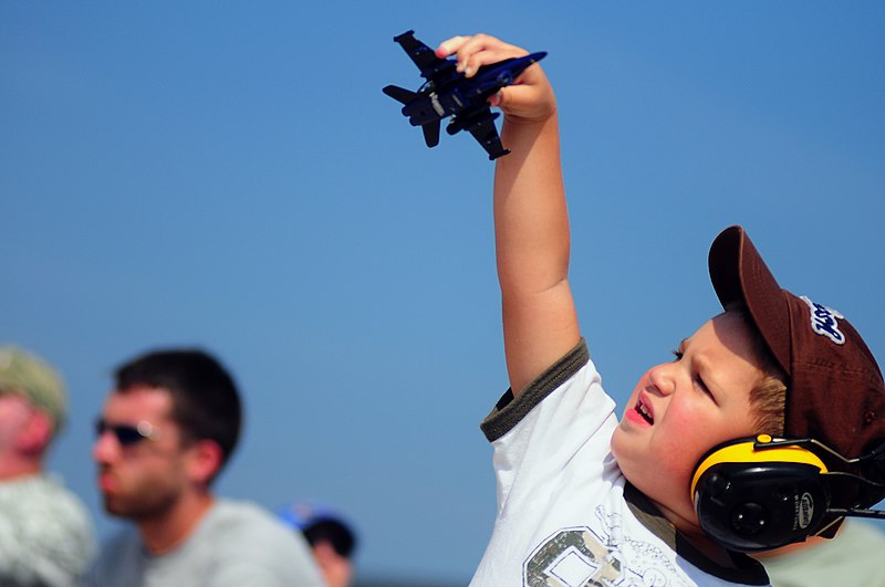 File:US Navy 080905-N-0411D-007 A boy plays with a model of a Blue Angels plane during the Great State of Maine Air Show at Naval Air Station Brunswick.jpg