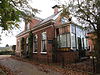 Winkelwoning met eclectische invloeden