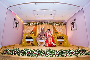 A Bengali Muslim couple on their wedding day from Bangladesh Worship of goddess, dinajpur, bangladesh.jpg