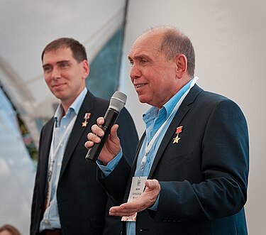 Russian cosmonauts Sergey Volkov and Aleksandr Volkov speaking at a festival event, 2013 Sergei i Aleksandr Volkovy.jpg